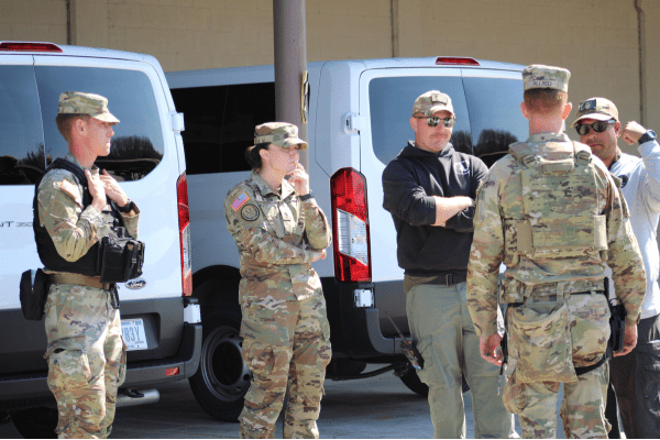 Transitioning from Military to Civilian Group of MWD Handlers and CCU Trainers during an MWD training session